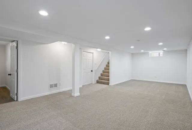 Finished basement with new carpet and recessed lighting, Twin Cities