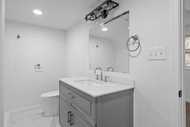 Bathroom with gray vanity and tile floor, Twin Cities
