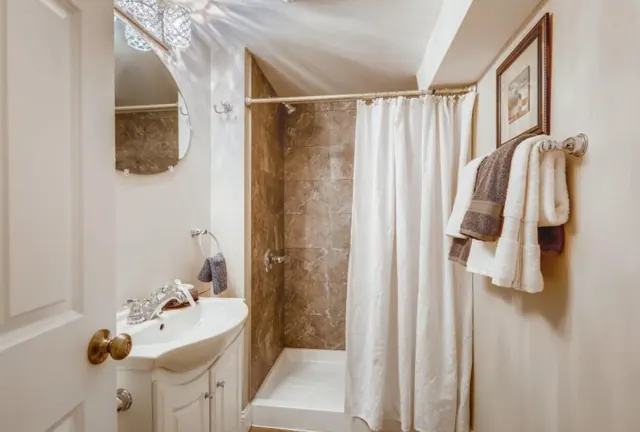 Basement bathroom with tiled shower, Twin Cities